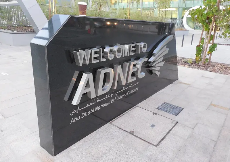 The Welcome to ADNEC sign outside the Abu Dhabi National Exhibition Centre